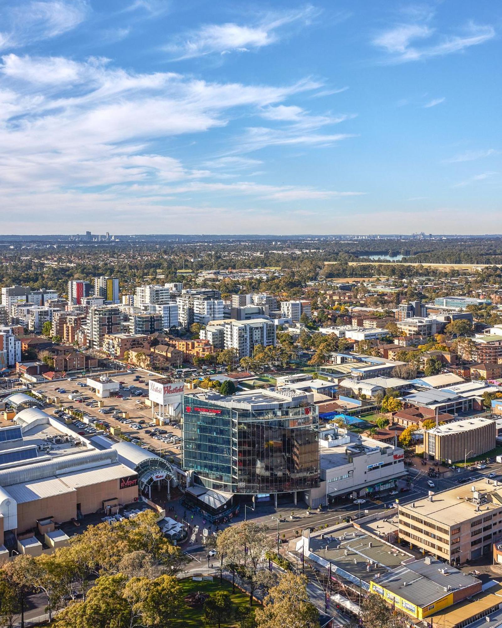Meriton Suites Liverpool Extérieur photo Aerial view of the suburb