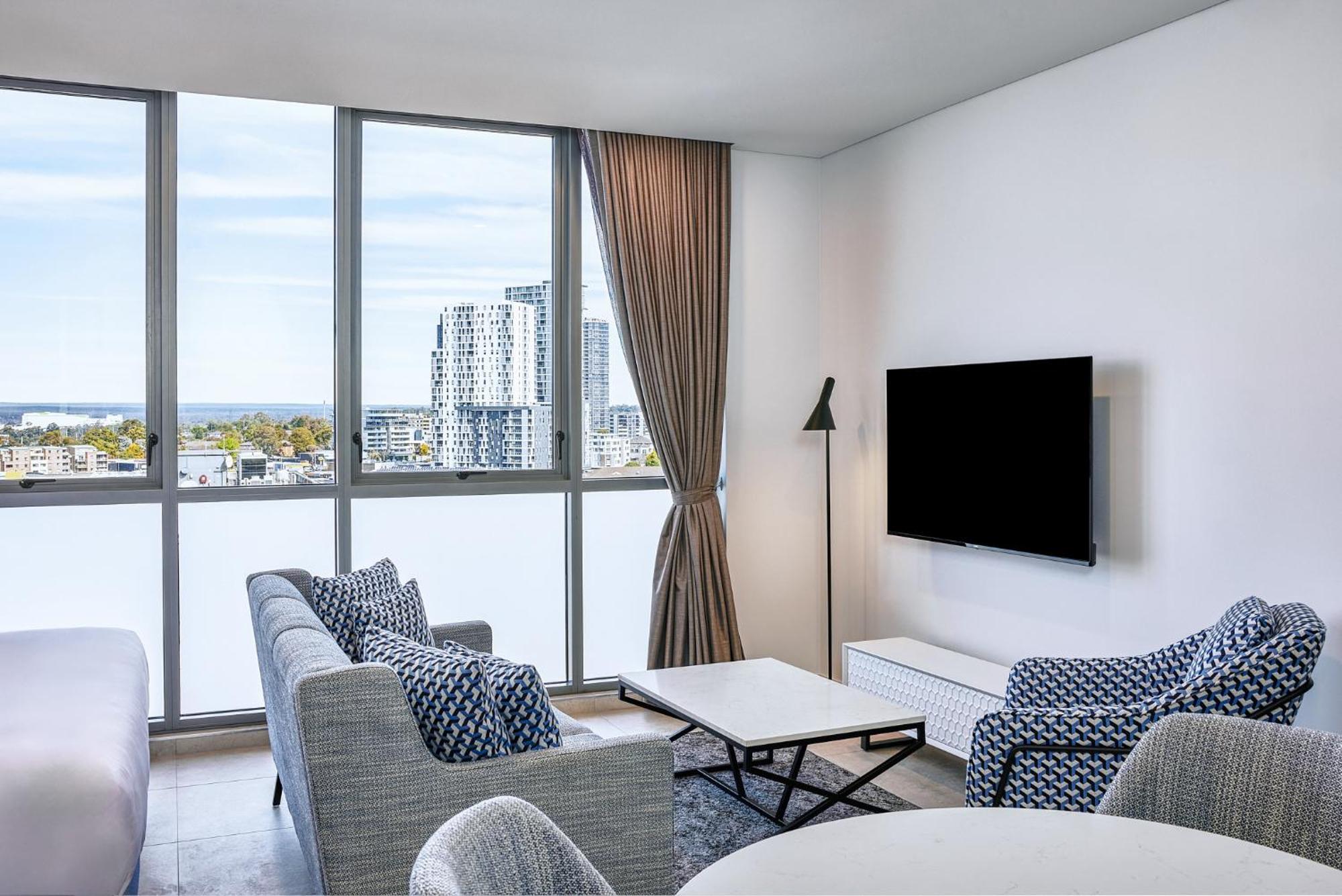 Meriton Suites Liverpool Extérieur photo Living room